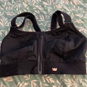 SHEFIT, front zip sports bra. Adjustable straps and torso band. Worn once.